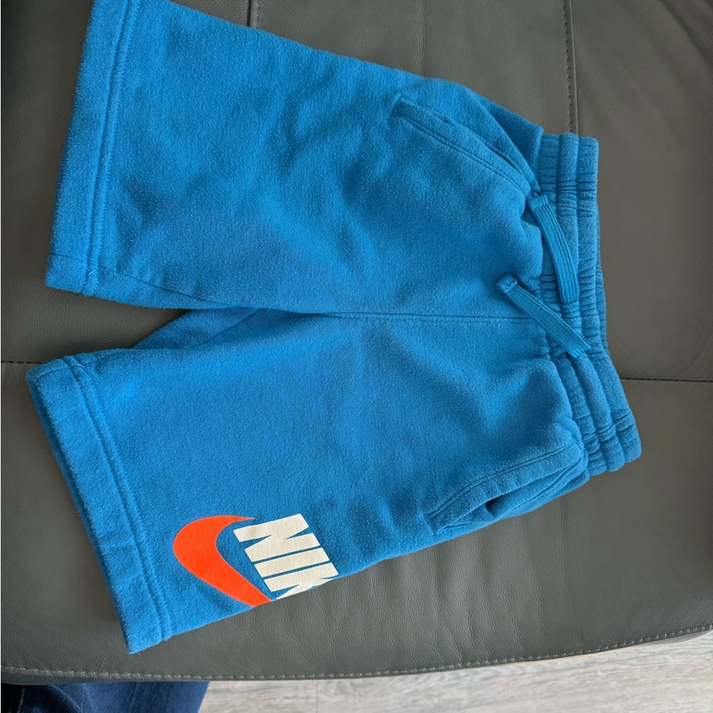 Nike Kids Bright Blue Shorts with Orange Logo
